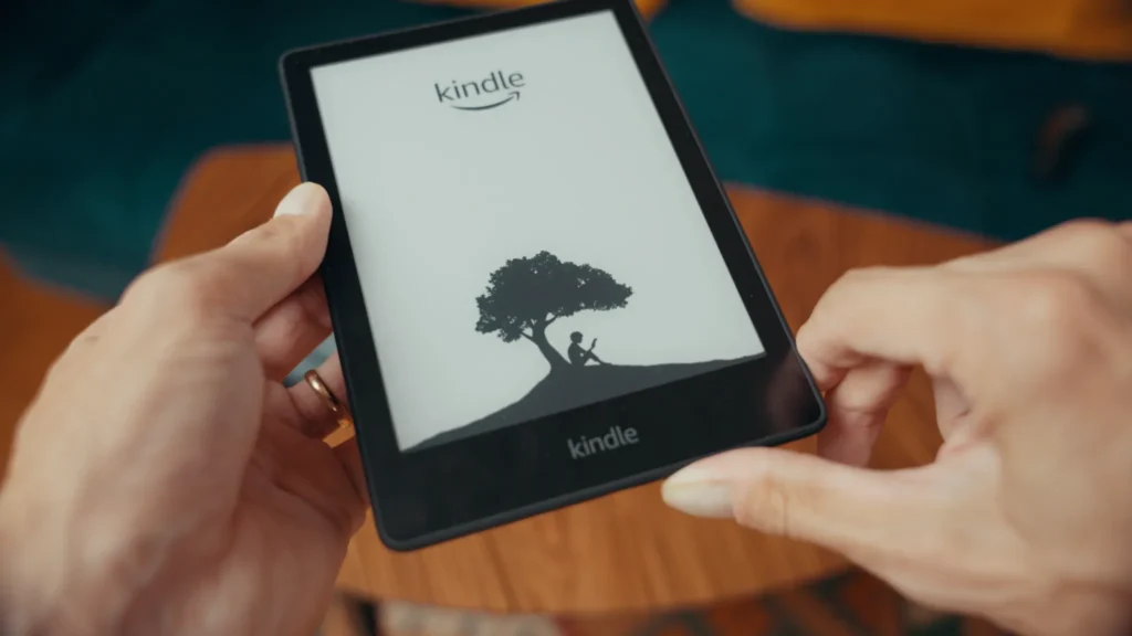 Soft reset your Kindle by holding the power button for 30-40 seconds.